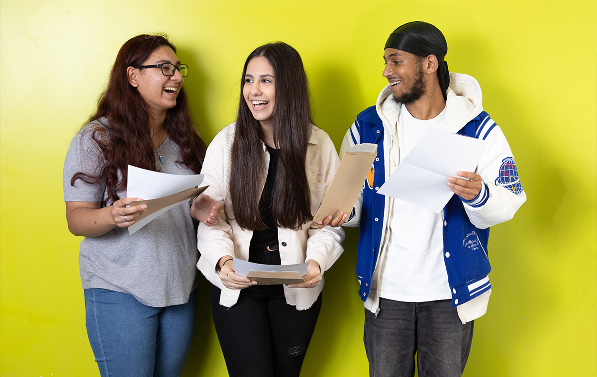 Students comparing exam results