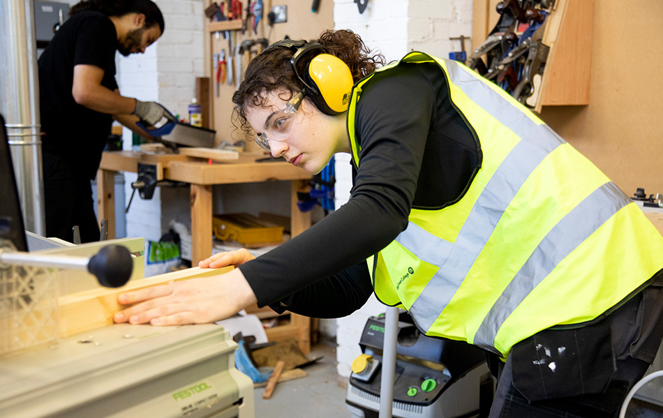 Student at a woodworking table