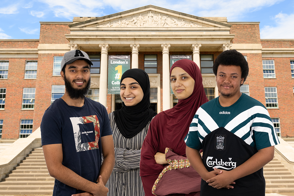 students smile standing in front of large building with pillars