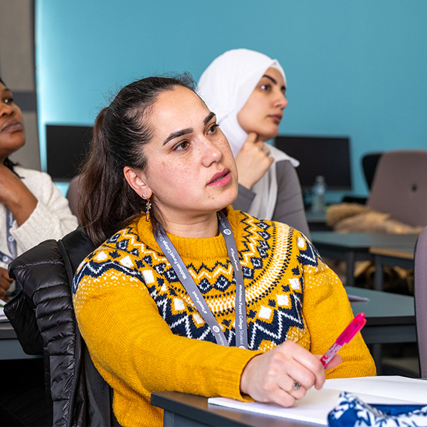 Student listening to a lecture in a classroom